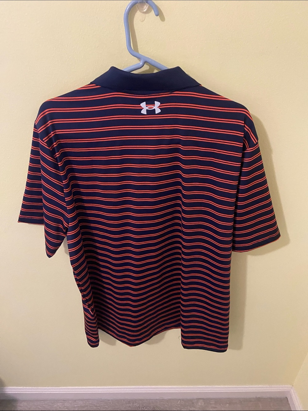 Under Armour Men’s Navy Polo with Orange Stripe Pattern - Picture 3 of 3